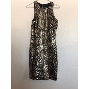 Black and gold sequence mini dress